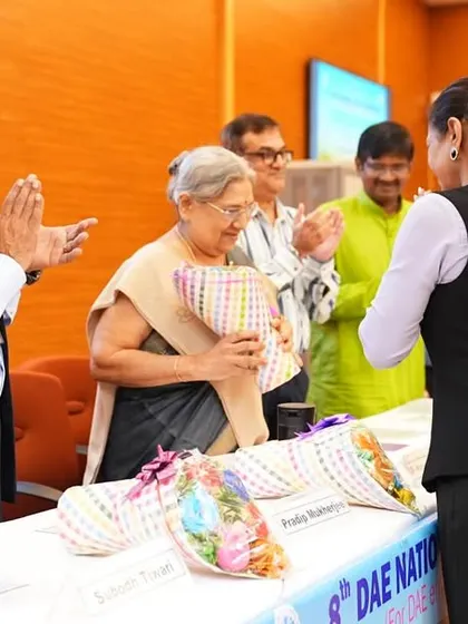 A moment of felicitation at the BARC yoga conference, where we honored speakers and scholars for their contributions.