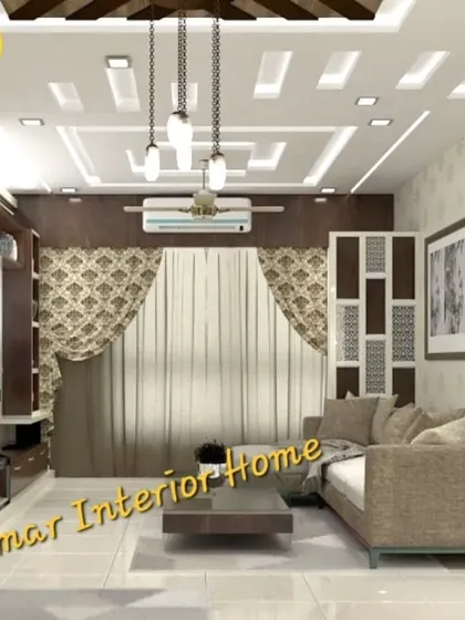 A cozy living room with an L-shaped sofa and a dark wood TV unit. The false ceiling design with a mix of recessed and pendant lights adds warmth and character to the space.