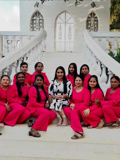 A group photo of another successful batch on their portfolio shoot day. The smiles on their faces show the confidence they have gained through the course.
