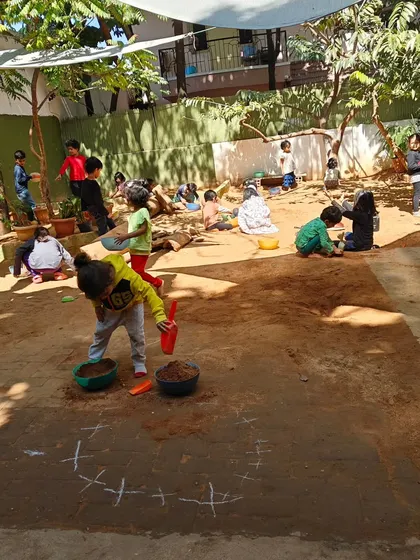 More scenes of mathematics in action, from children measuring themselves against a chalkboard to creating secret rooms of math puzzles. These images show how math is a joyful, creative, and collaborative language at our school.