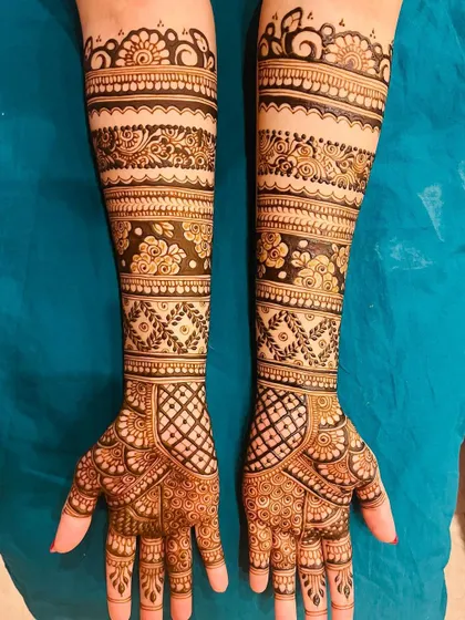A classic bridal look with bands of different patterns. This style features alternating floral, geometric, and traditional motifs for a rich and varied texture.