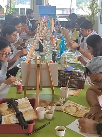 A full house on a Saturday! The studio is buzzing with people enjoying a variety of art activities.