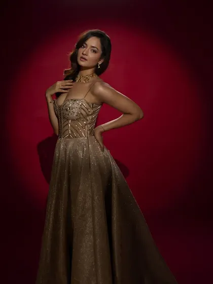 A stunning shot of actress Shanvi Srivastava in my custom gold gown. The structured, embellished corset and the full, shimmering skirt create a look of pure Hollywood glamour.