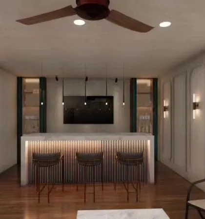 A home bar is a fantastic addition for those who love to entertain. This design features an under-lit bar counter, comfortable stools, and elegant wall paneling, creating a sophisticated spot to unwind after a long day.