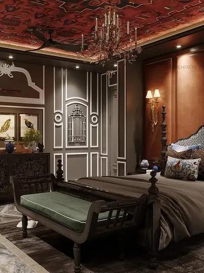 Step into timeless elegance with this classic-themed bedroom. The design features a rich red wallpapered ceiling, a leatherette-paneled bed wall with a statement poster bed, and classic POP mouldings for a royal ambiance.