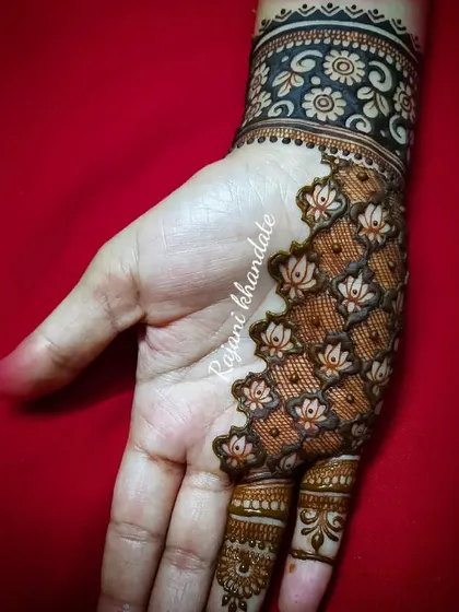 This gallery showcases a variety of my traditional designs. You'll find classic elements like peacocks, elephants, lotuses, and intricate jaali (net) patterns, all expertly crafted to create timeless beauty.