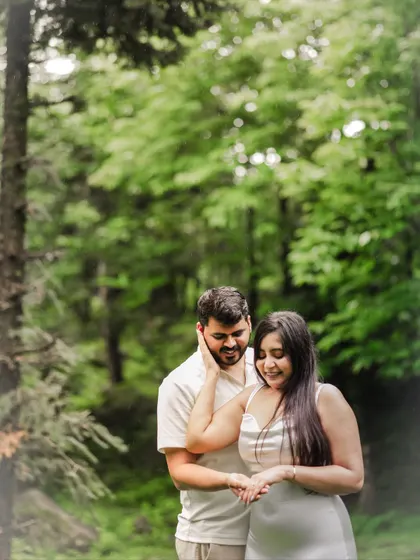A gentle, romantic portrait in the same forest setting. After the excitement, we take a few moments for quiet portraits that reflect their new status as an engaged couple.