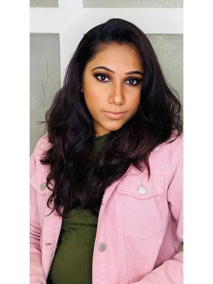 This full view shows how a dramatic smokey eye can be the centerpiece of a party look. It's confident, stylish, and perfect for an evening celebration.
