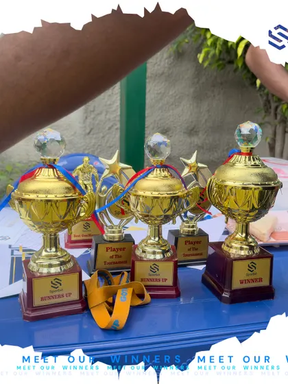 A collection of winner and runners-up trophies waiting to be awarded. We ensure our tournaments are well-organized and that every achievement is celebrated properly.
