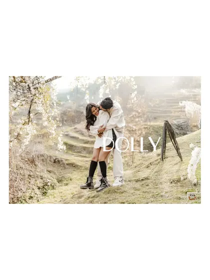 A dreamy, sun-flared shot from a Kashmir pre-wedding session, highlighting the romantic and ethereal mood.