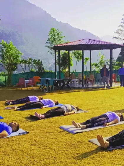 There is profound healing in stillness. This is a moment of complete relaxation in Savasana during one of my yoga retreats in Rishikesh. Practicing outdoors, surrounded by nature, allows for a deeper connection to the self and a true release of mental and physical stress.