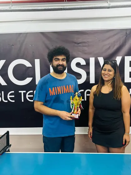 Celebrating the winner of an internal tournament. We foster a healthy competitive spirit within the academy to prepare players for external championships.