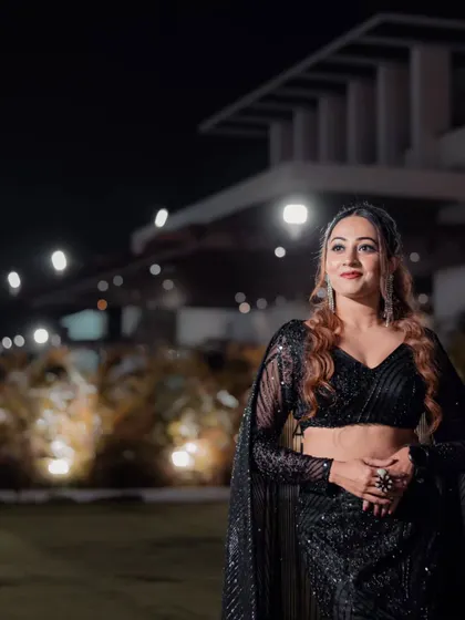 Another shot of my "Back with Black" look. A classic black outfit with a modern twist is always a winning choice for an evening event.
