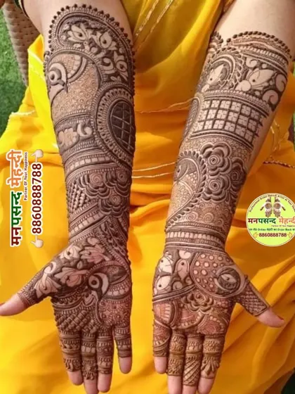 A stunning example of a full-coverage Arabic-style mehndi. The design is dense with intricate paisleys, florals, and geometric fills, creating a rich and luxurious look.