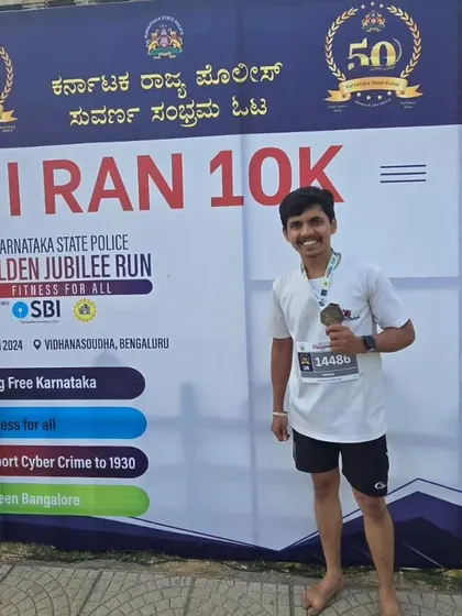 Another shot of our barefoot runner with his finisher medal. A true inspiration for the team.