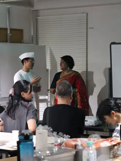 Interacting with the guests in Nagoya, answering their questions about our spices, cooking techniques, and culture.