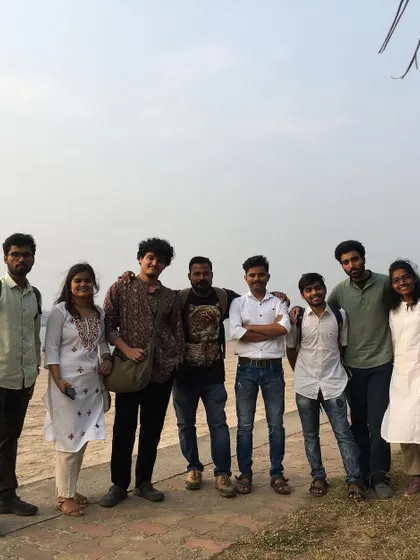 A group photo with fellow artists at the Indian Navy Day event. Collaborating with other artists is always an inspiring part of these workshops.