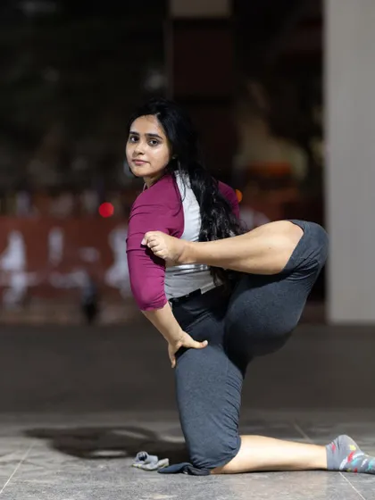 This is what real effort looks like. We'll work on building the strength for demanding arm balances and hip openers, celebrating the process, not just the result.