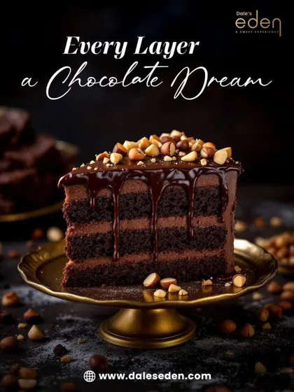 A closer look at my layered chocolate and hazelnut cake. You can see the rich, velvety texture of the chocolate mousse between moist cake layers, all topped with a glossy ganache drip and crunchy roasted hazelnuts.