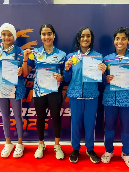 The women's 4x200 Freestyle Relay team after setting a new national record.