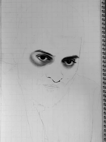 The 90-hour process of creating the Guddu Pandit portrait. These images show the careful layering of charcoal and graphite to achieve the intense, gritty look.