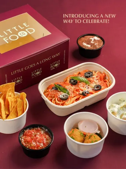 Introducing a new way to celebrate with my custom meal boxes. This image shows a sample meal with spaghetti, nachos, and other sides, all neatly packed in my branded containers, perfect for a personalized party experience.