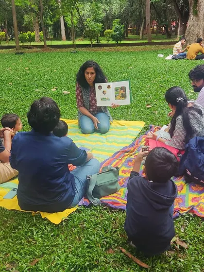 Reading 'The Gruffalo' to an eager audience. Using different voices and expressive gestures, I bring the classic characters of the deep, dark wood to life.