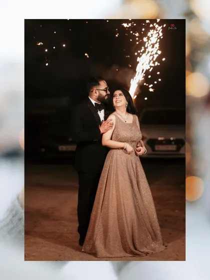 A magical moment captured with sparklers, celebrating the couple's engagement under the night sky.