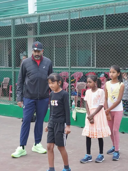 Watching over the next generation of potential tennis stars. During our selection process, we observe the kids closely to identify not just their physical abilities but also their focus and eagerness to learn.