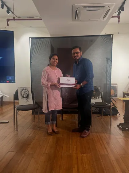 Receiving my certificate of participation from Pramod Kurlekar after the portrait painting workshop. Cherishing these memories forever.