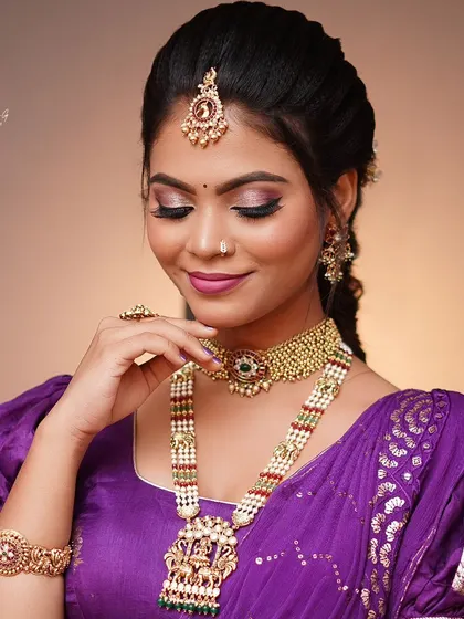 Another shot from the same makeup session, highlighting the traditional jewelry paired with our outfit.