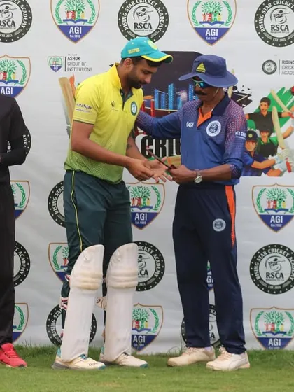 A player receives the Man of the Match award during the post-match presentation of the Sindoor Friendship Cup, a T20 tournament.