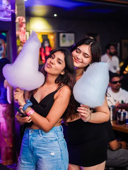 It's the small details that make a night special. At my Tease Tuesday events, we even have free cotton candy for the ladies, adding a fun, unique touch to the party.