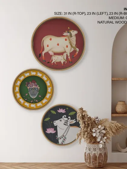 This set of three traditional Pichwai paintings in circular wooden frames adds a touch of divine art to any room. They are perfect for creating a gallery wall that celebrates Indian heritage.