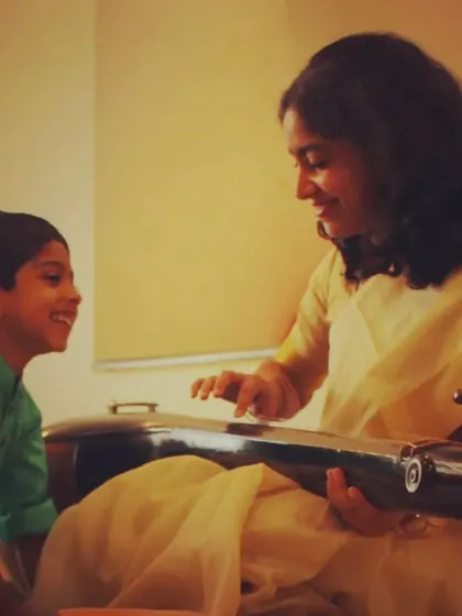 A quiet moment of connection between a teacher and a student is where the real magic happens. I love sharing the stories and sounds of the Veena, watching a child's face light up as they learn to create their own music.