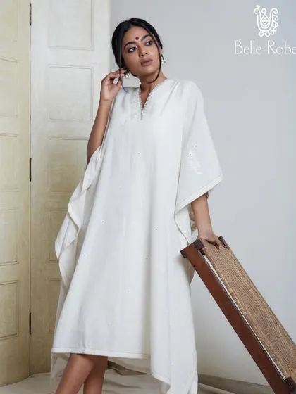 Another angle from the Belle Robe shoot, showcasing the simple and elegant makeup. The look is timeless and enhances the model's natural beauty, fitting the brand's aesthetic.