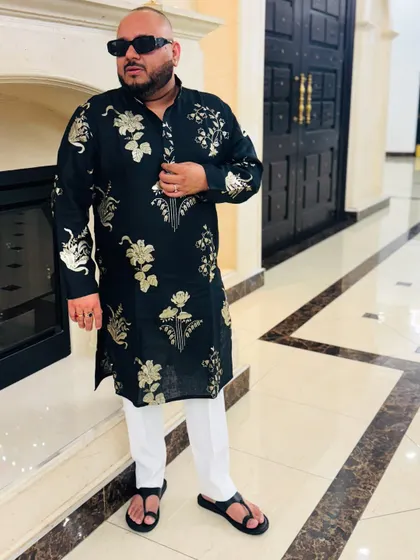Rocking a traditional kurta for an Indian wedding event in Canada. It's all about respecting the culture while bringing the energy.