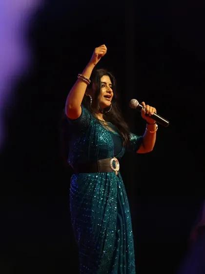 Raising a hand to the sky, feeling the energy of the crowd. Every performance is a celebration, and I am so thankful for every moment on stage.