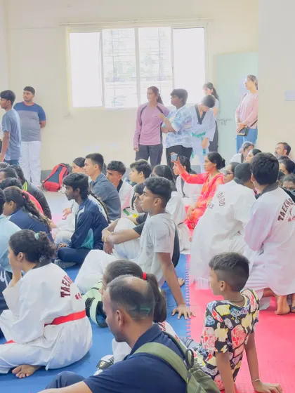 The supportive environment of our academy is clear in this picture, with students and parents united in their passion for Taekwondo.