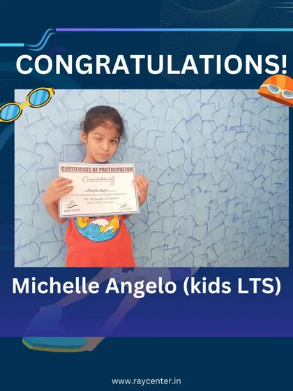 Michelle Angelo proudly displays her Certificate of Participation from our Kids Learn to Swim (LTS) program.