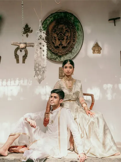 Elegance in simplicity. For this daytime wedding, we worked with the couple to create a timeless look, pairing their classic ivory outfits with the venue's natural heritage charm. This is how we turn moments into classic portraits.