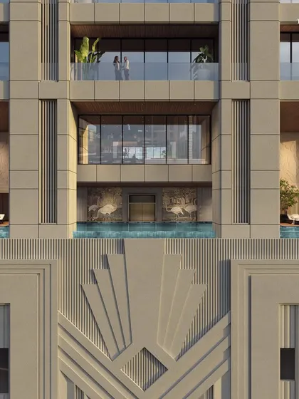 A detailed look at the facade of Empire Tower, where private plunge pools are integrated into the Art Deco design. This showcases our philosophy of embedding bespoke luxury within a grand architectural statement.