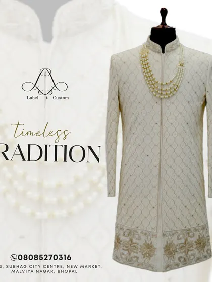 Timeless tradition is always in style. This graphic showcases a beautiful sherwani with delicate embroidery along the hem, paired with a classic pearl necklace.