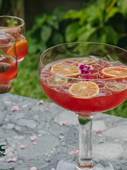 A toast with our Sakura cocktail, a drink that's meant to be shared.