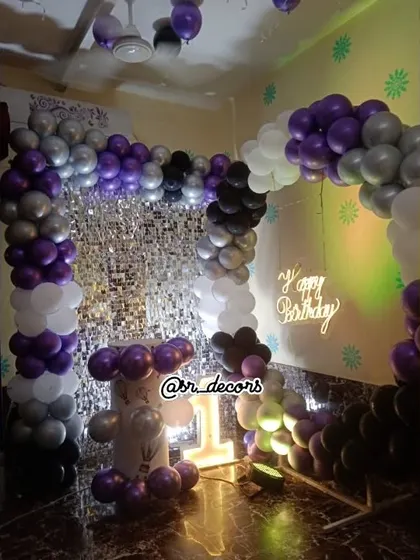 Another angle of the versatile shimmer wall and balloon arch combination, ready for any celebration.