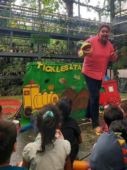 Performing "The Little Blue Engine" for a large group of families at a school celebration. It was amazing to see so many people cheering and enjoying the story.