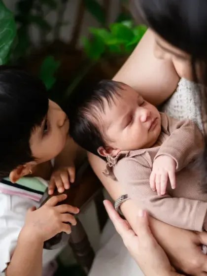 A big brother meets his new sibling for the first time. This is such a precious moment, full of curiosity and love. Capturing sibling interactions during a newborn session is always a priority.