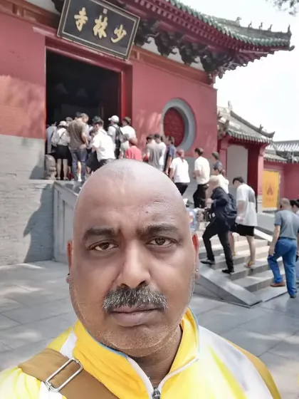 At the main entrance of the Shaolin Monastery in China. This is the gateway to the world's most renowned temple for martial arts and Zen Buddhism.