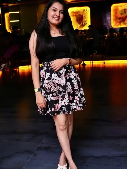 A partygoer posing for a photo at Tipsy Bull. The venue has a great vibe for a night out.
