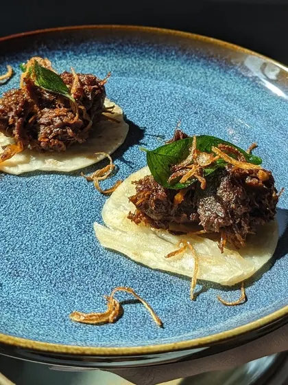 My Beef Ullarthu is an emotion. I serve these succulent, slow-roasted beef chunks, tossed with coconut chips and aromatic spices, on mini parottas. It’s the perfect bite-sized starter to kick off a memorable meal.